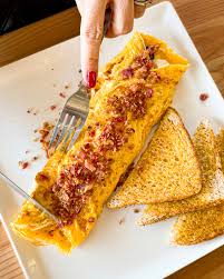 OMELETTE MADURO CON TOCINETA